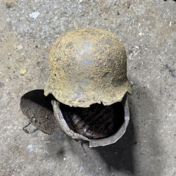 M40 German Helmet with a bullet hole