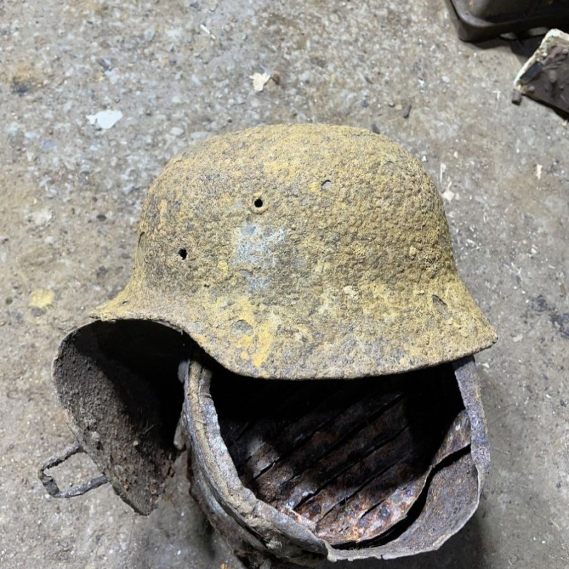 M40 German Helmet with a bullet hole