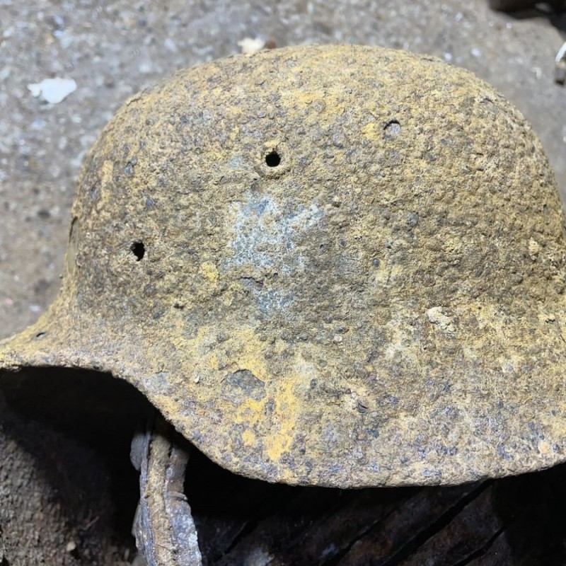 M40 German Helmet with a bullet hole