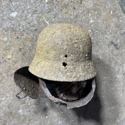 M40 German Helmet with a bullet hole