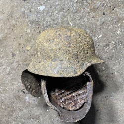 M40 German Helmet with a bullet hole