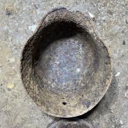 M40 German Helmet with a bullet hole